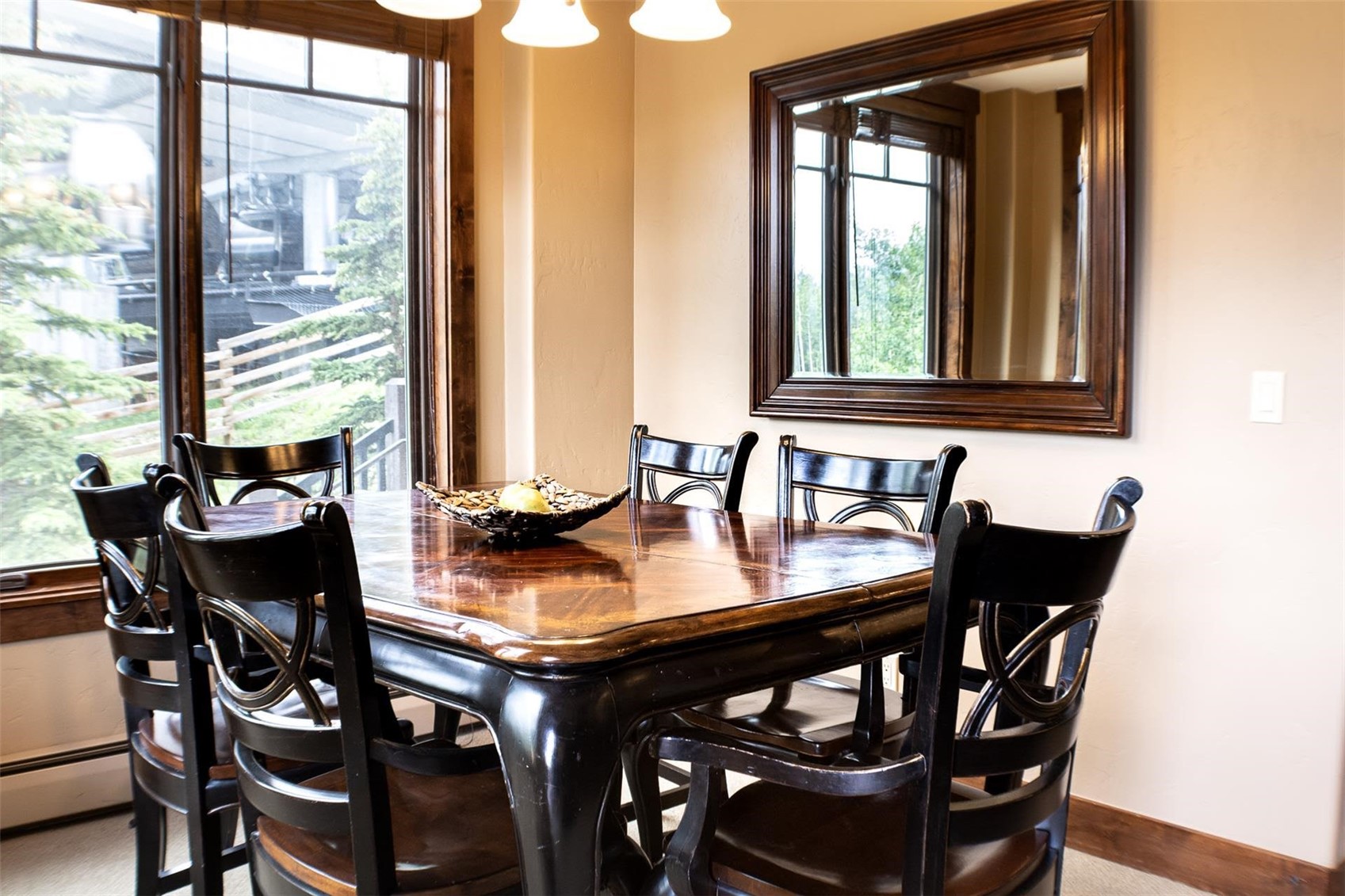 1891 Ski Hill Road, Unit 7000 Breckenridge, CO 80424 - Photo 10 of 25 a view of a dining room with furniture and window