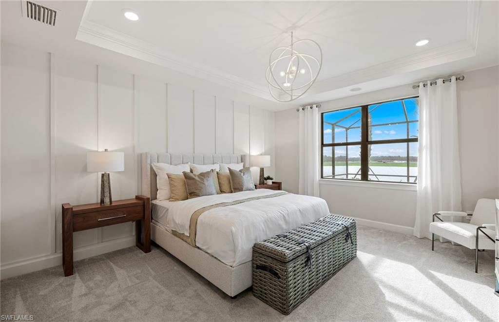 20498 Pebble Gln Drive Estero, FL 33928 - Photo 37 of 46 a bedroom with a bed and a window