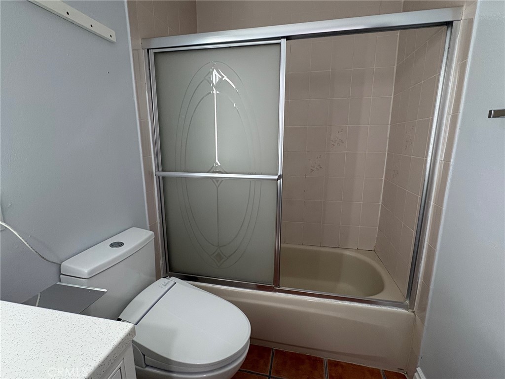 20730 Community Street Winnetka, CA 91306 - Photo 12 of 12 a white toilet sitting next to a shower