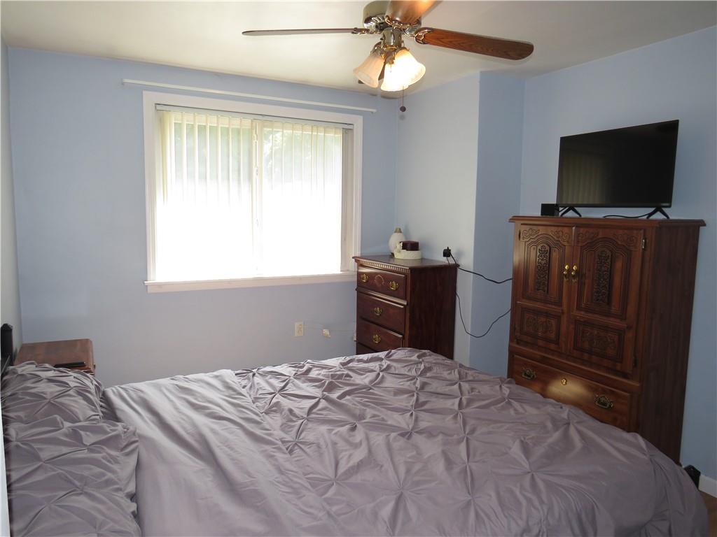 41 Blair Road Eighty Four, PA 15330 - Photo 12 of 33 a bedroom with a bed and a flat screen tv