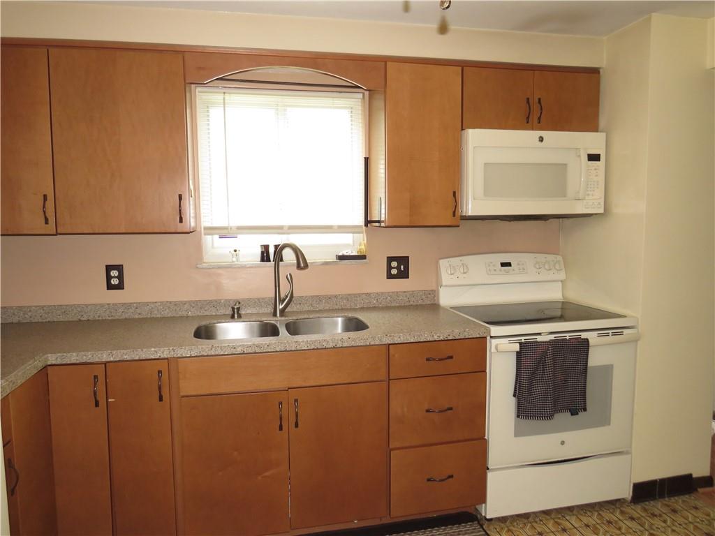 41 Blair Road Eighty Four, PA 15330 - Photo 20 of 33 a kitchen with a sink stove and cabinets