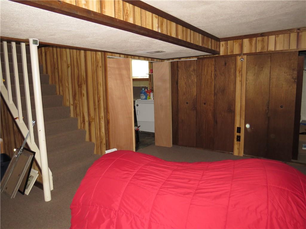 41 Blair Road Eighty Four, PA 15330 - Photo 22 of 33 a bedroom with a bed and a dresser
