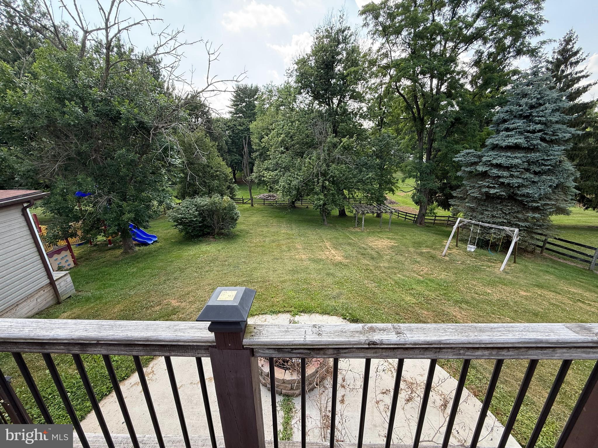 858 Star Court Union Bridge, MD 21791 - Photo 7 of 37 a view of a wooden deck and a yard