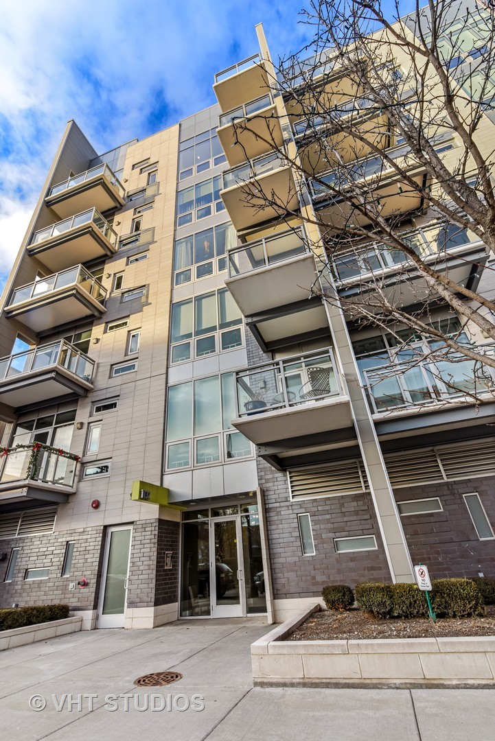 1132 West Adams Street, Unit PHE Chicago, IL 60607 - Photo 1 of 23 front view of a building