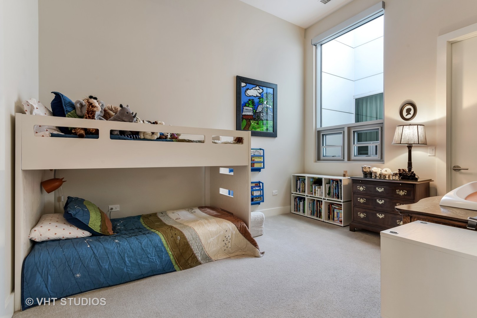 1132 West Adams Street, Unit PHE Chicago, IL 60607 - Photo 12 of 23 a bedroom with a bed and a dresser