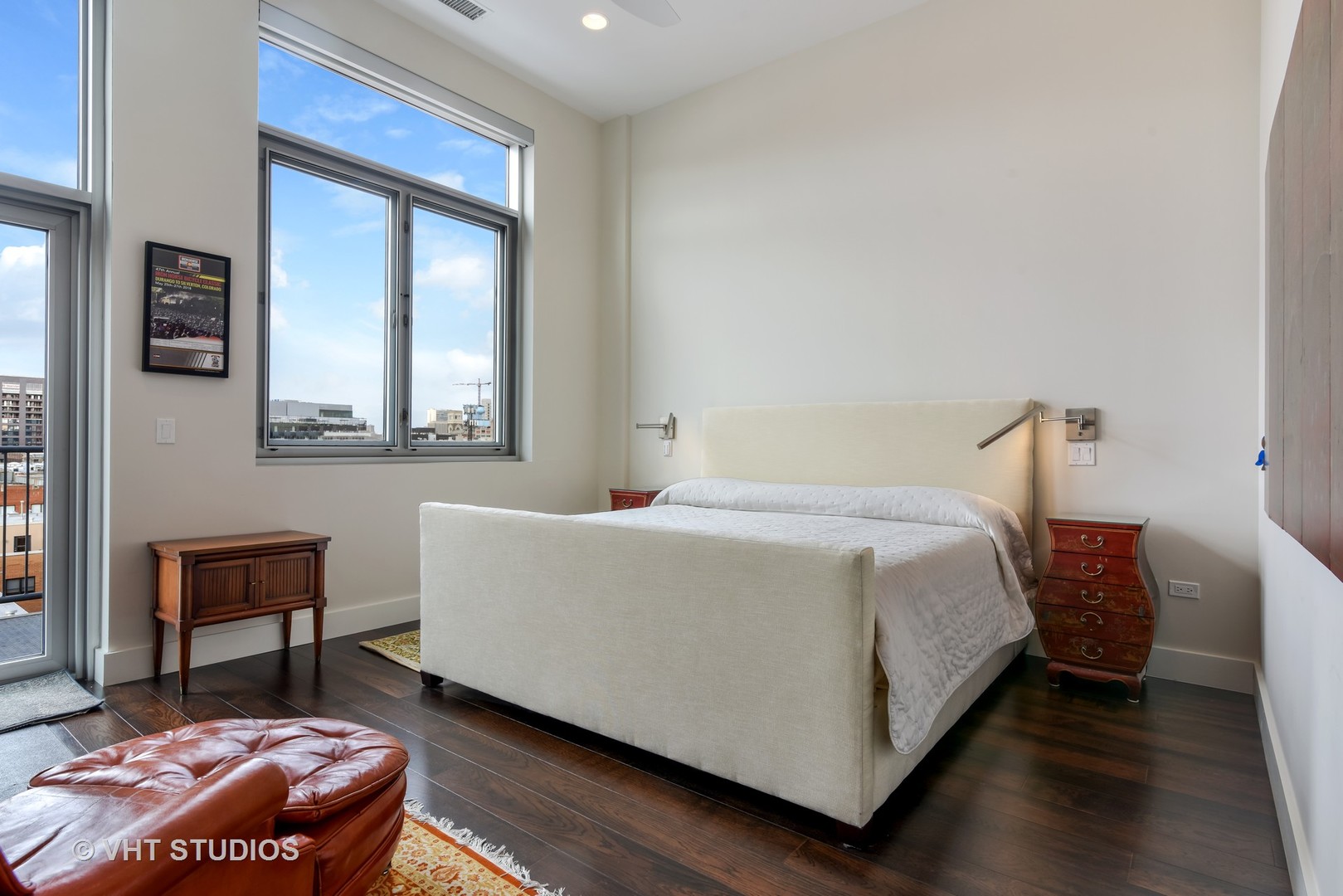 1132 West Adams Street, Unit PHE Chicago, IL 60607 - Photo 8 of 23 a bedroom with a bed and wooden floor