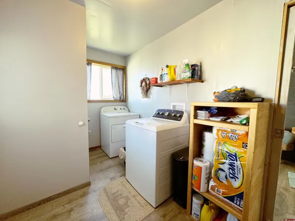 a bathroom with a sink and a window