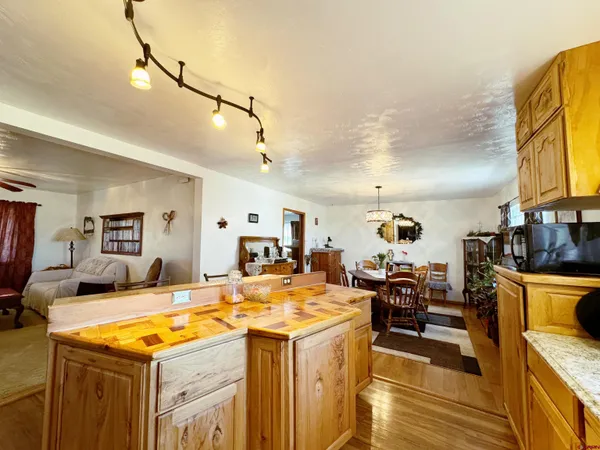 a view of a living room and dining room