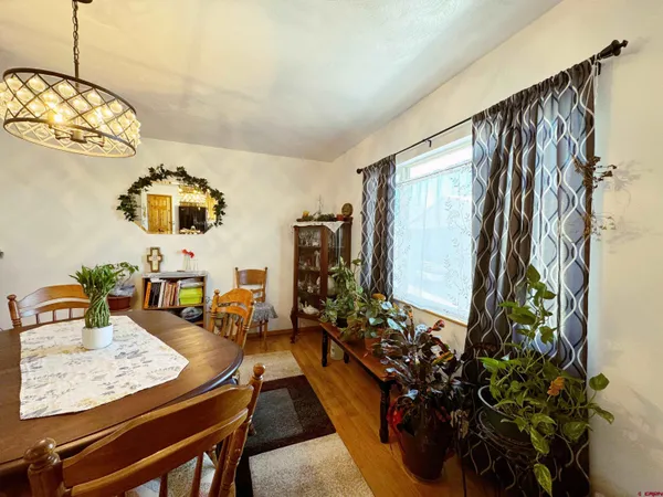 a view of a living room and dining room