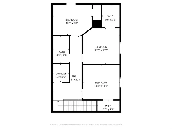 a picture of a bench in front of a building