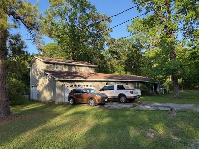 235 Connell Road Vidor, TX 77662 - Photo 4 of 35 a front view of a house with garden