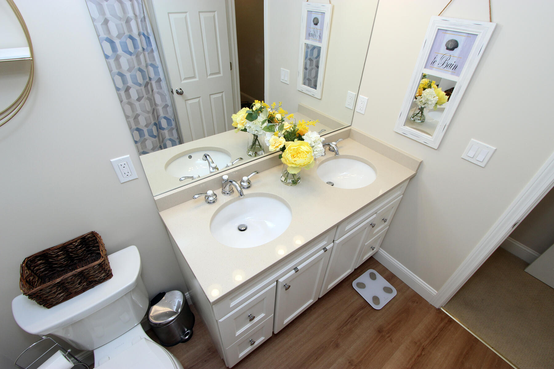 245 Simon Narrows Road Mashpee, MA 02649 - Photo 21 of 38 a bathroom with a sink mirror and vanity