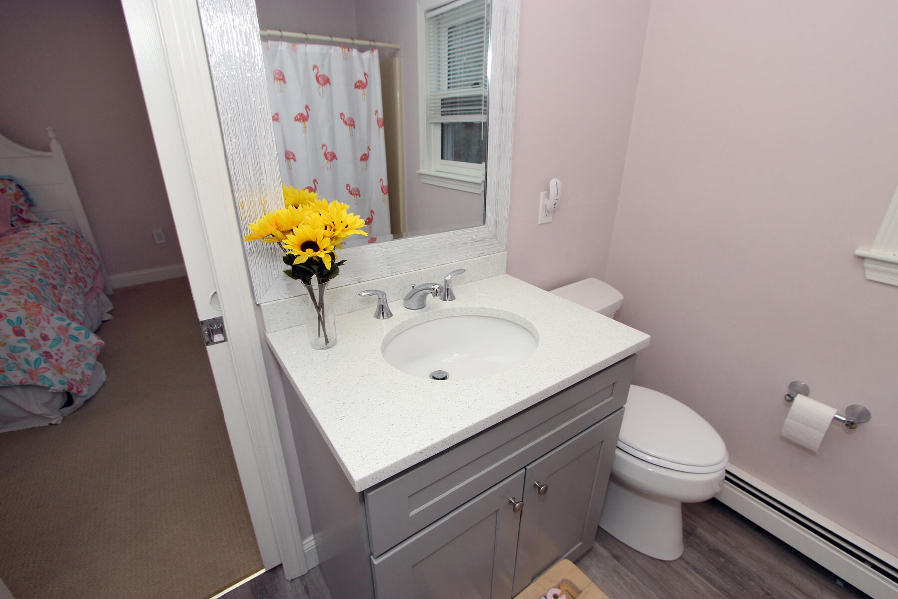 245 Simon Narrows Road Mashpee, MA 02649 - Photo 25 of 38 a bathroom with a sink toilet and mirror