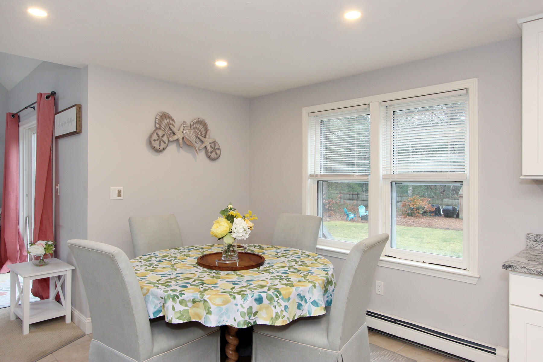 245 Simon Narrows Road Mashpee, MA 02649 - Photo 8 of 38 a view of a dining room with furniture and a window