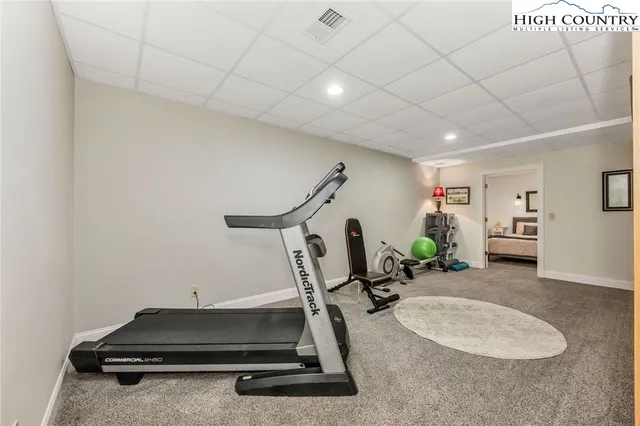 a living room with furniture and a couch