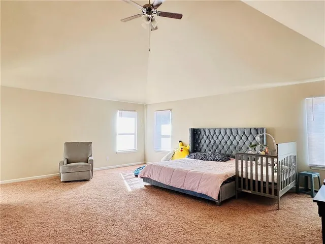 a bathroom with a tub and shower