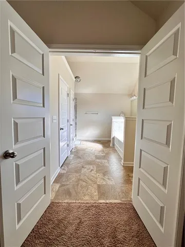 a bathroom with a sink a mirror and a bathtub