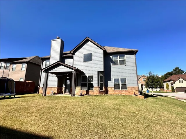 a view of swimming pool with outdoor seating