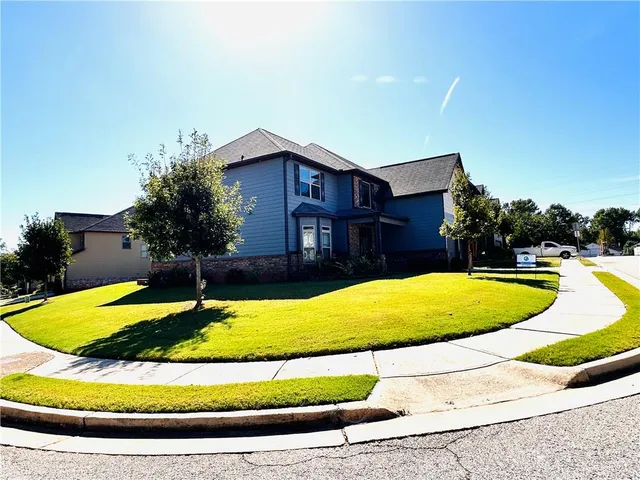 an aerial view of residential building with outdoor space
