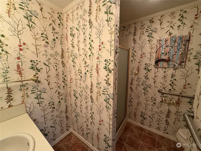 a kitchen with a table and chairs in it