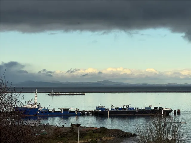 a kitchen that has a sink and a stove
