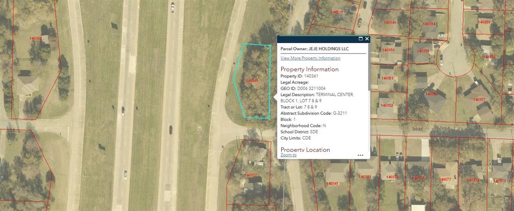 3300 West Morton Street Denison, TX 75020 - Photo 5 of 6 a picture of a bathroom with a shower curtain