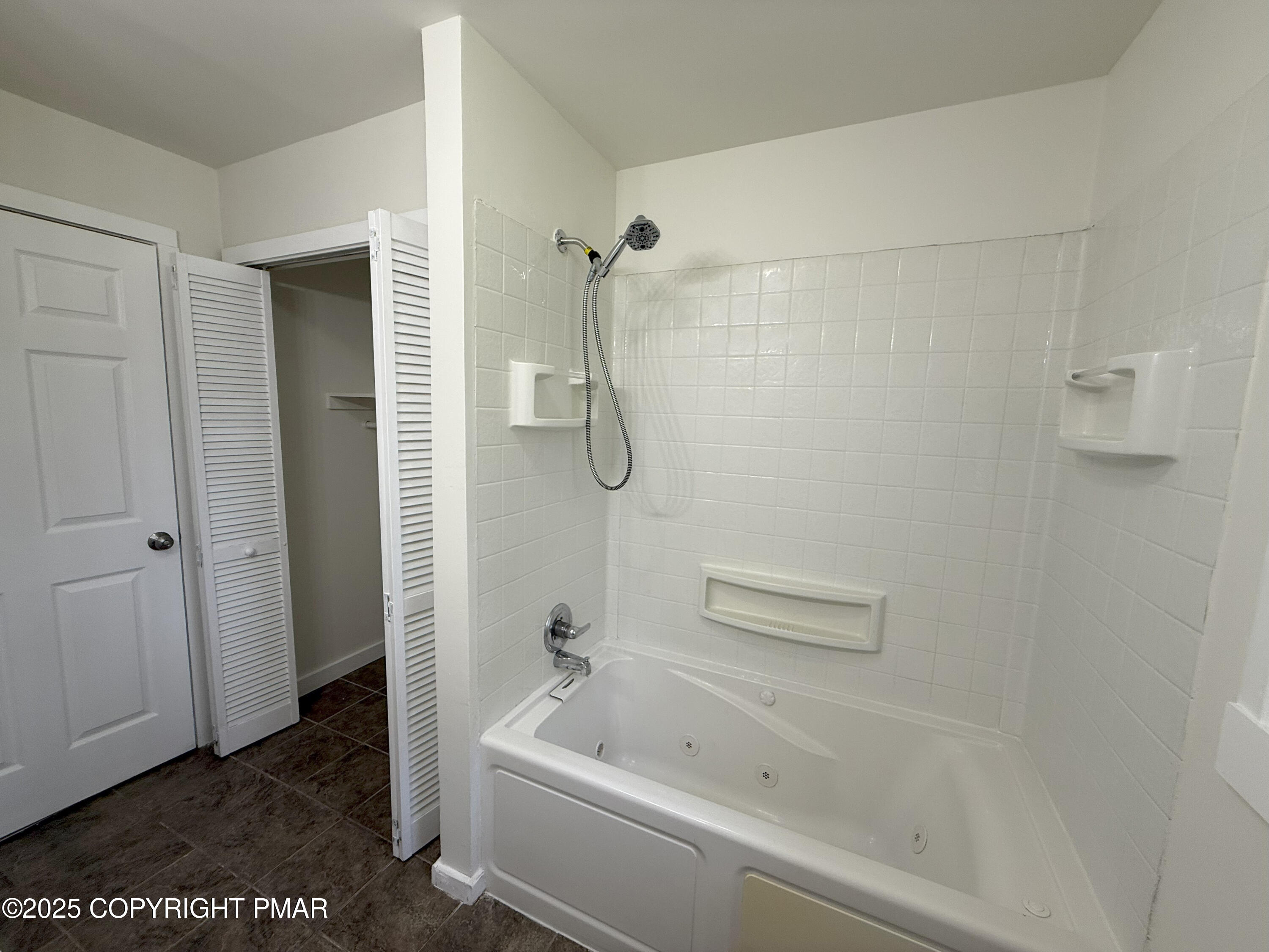 505 Stewart Court Bushkill, PA 18324 - Photo 19 of 34 a bathroom with a shower and a bath tub