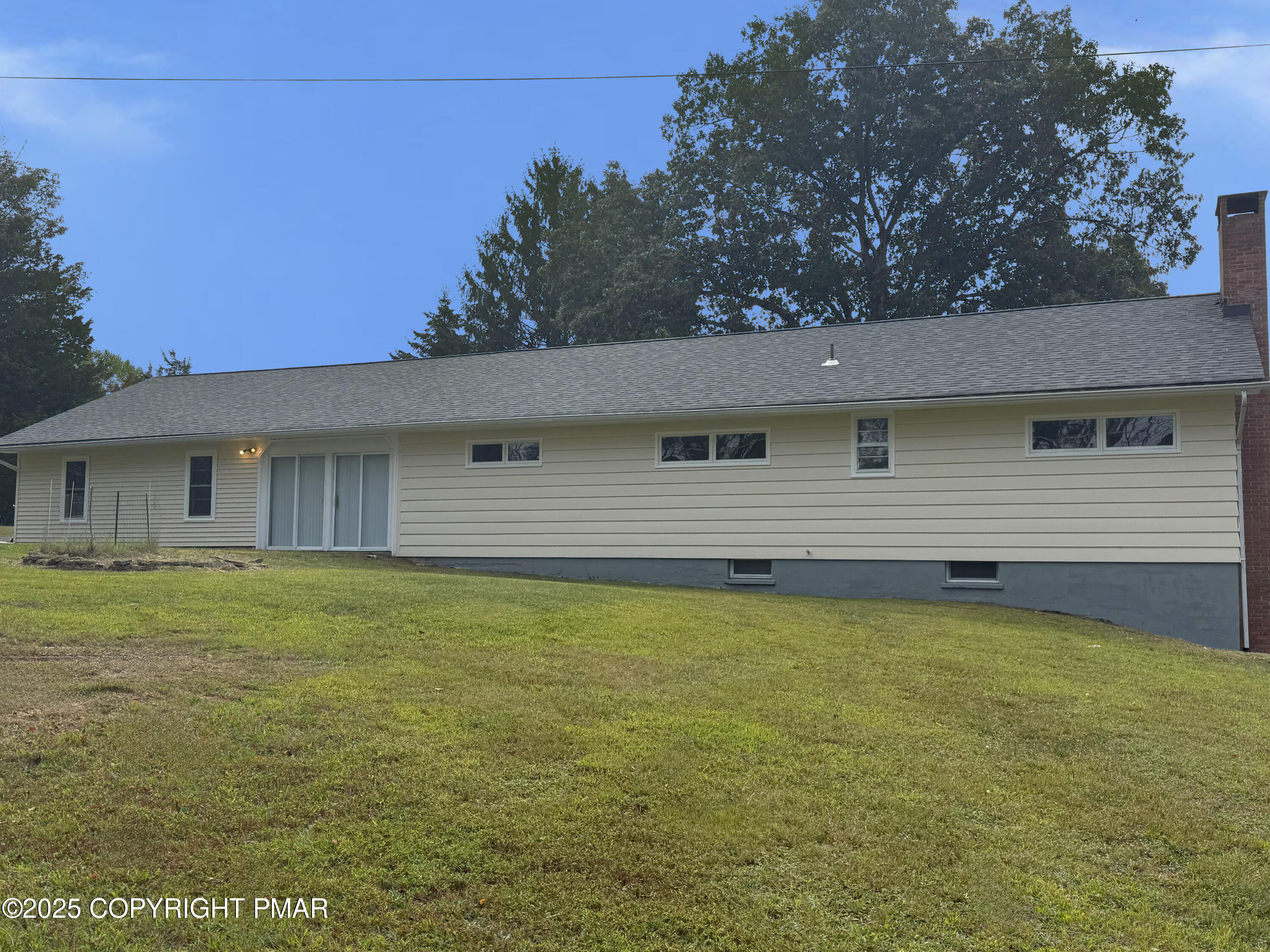 505 Stewart Court Bushkill, PA 18324 - Photo 6 of 34 a front view of a house with garden