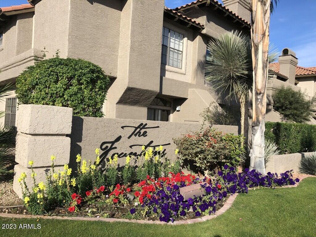 10017 East Mountain View Road, Unit 2053 Scottsdale, AZ 85258 - Photo 3 of 31 a view of a potted flower in a yard