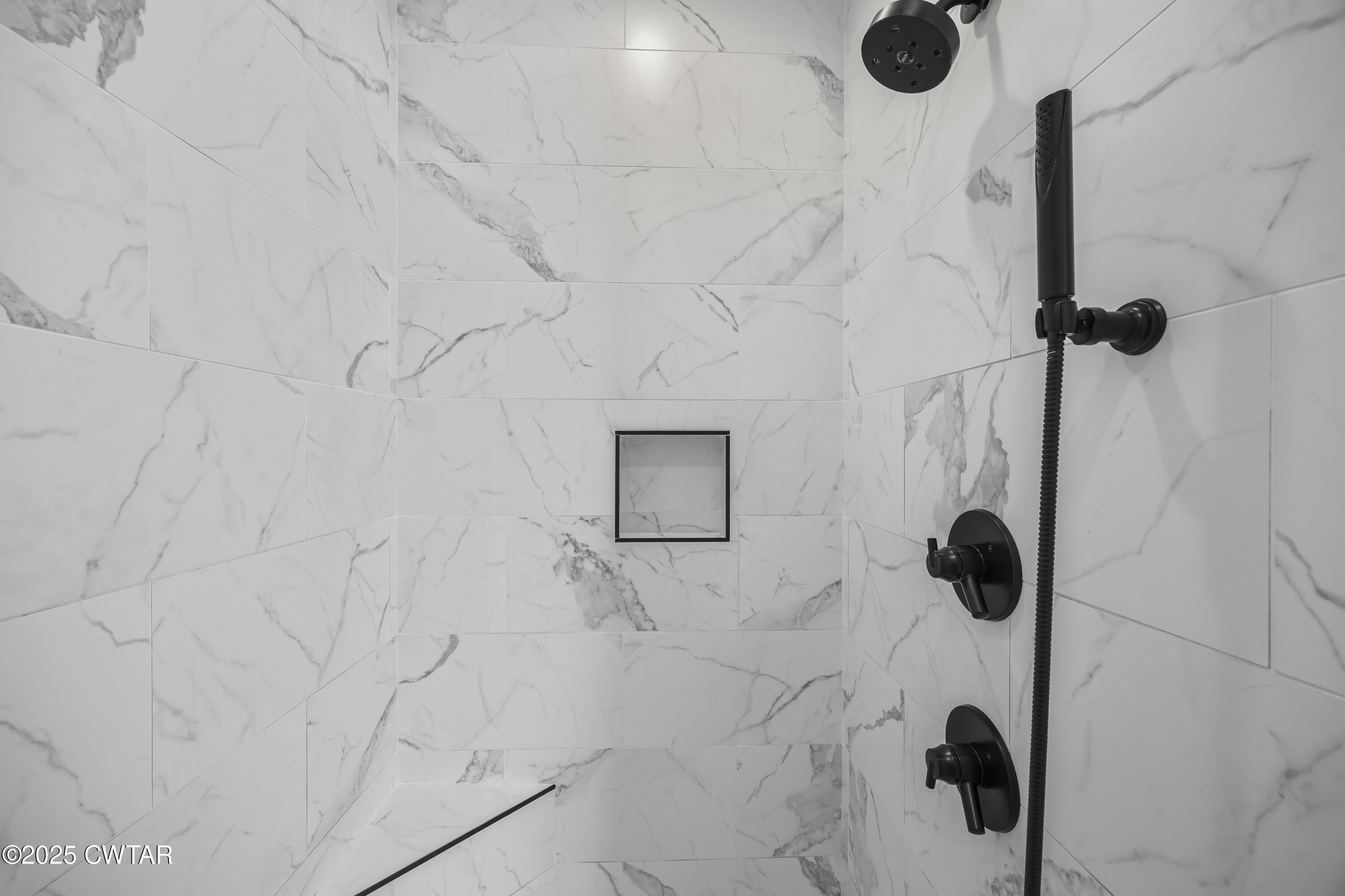 7 Swanbourne Cove Jackson, TN 38305 - Photo 16 of 44 a bathroom with a shower