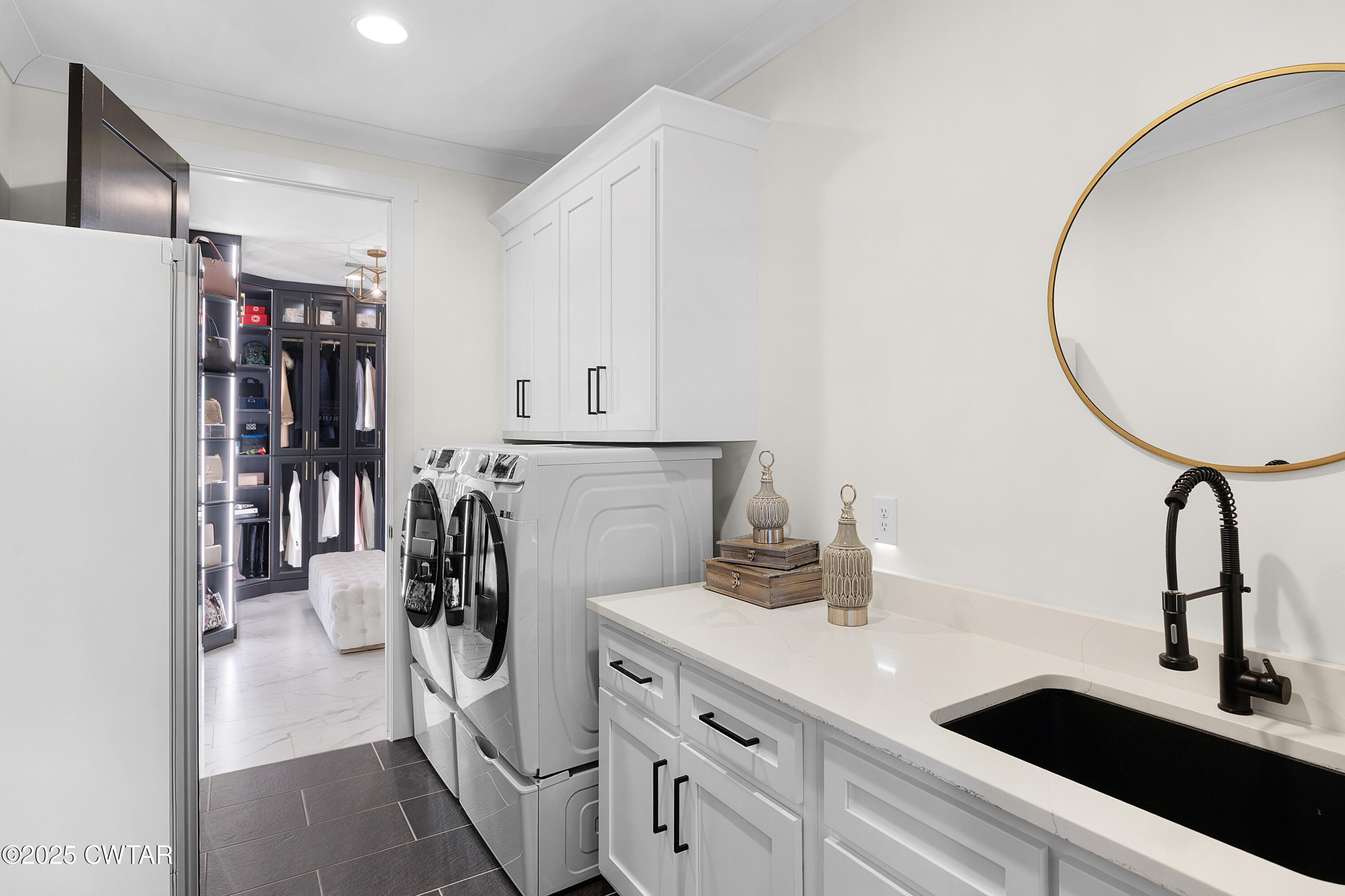 7 Swanbourne Cove Jackson, TN 38305 - Photo 21 of 44 a kitchen with a sink and refrigerator