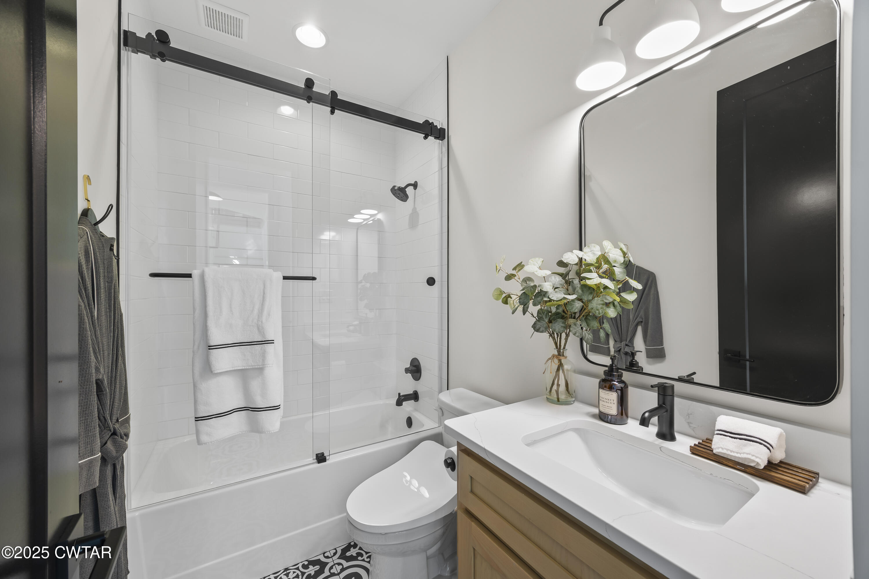 7 Swanbourne Cove Jackson, TN 38305 - Photo 23 of 44 a bathroom with a granite countertop sink toilet and shower