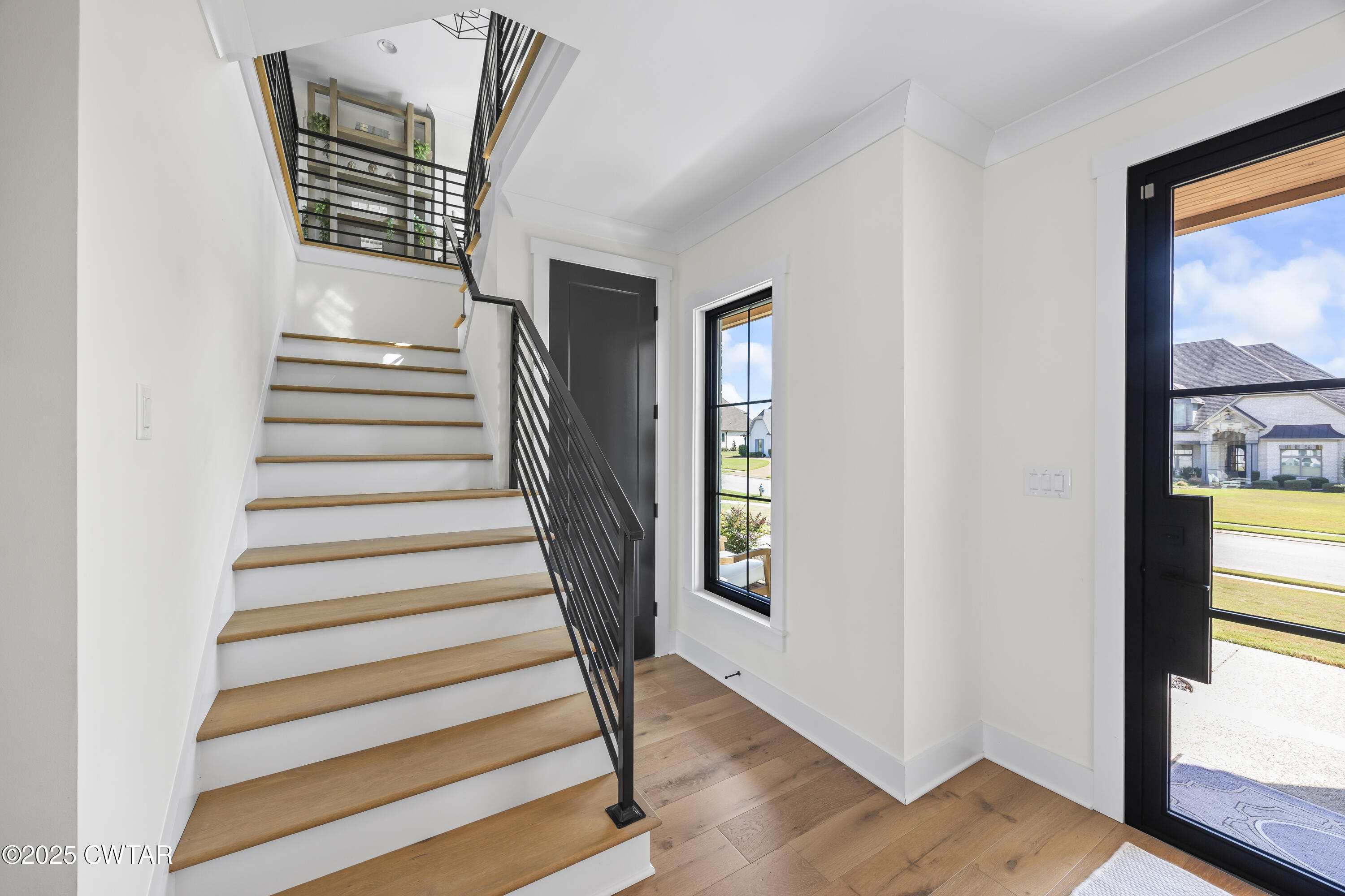 7 Swanbourne Cove Jackson, TN 38305 - Photo 24 of 44 a view of entryway and hall with wooden floor