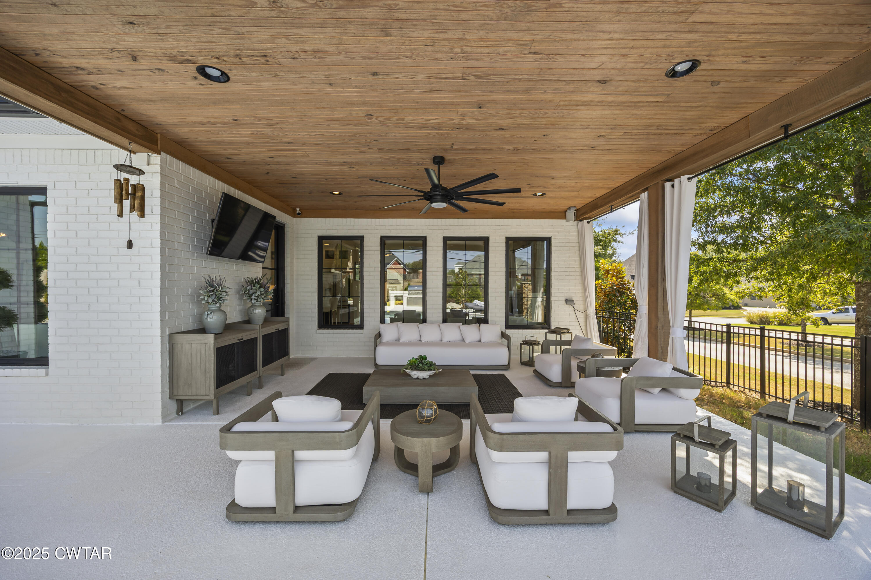 7 Swanbourne Cove Jackson, TN 38305 - Photo 33 of 44 a very nice looking living room with a large window and furniture