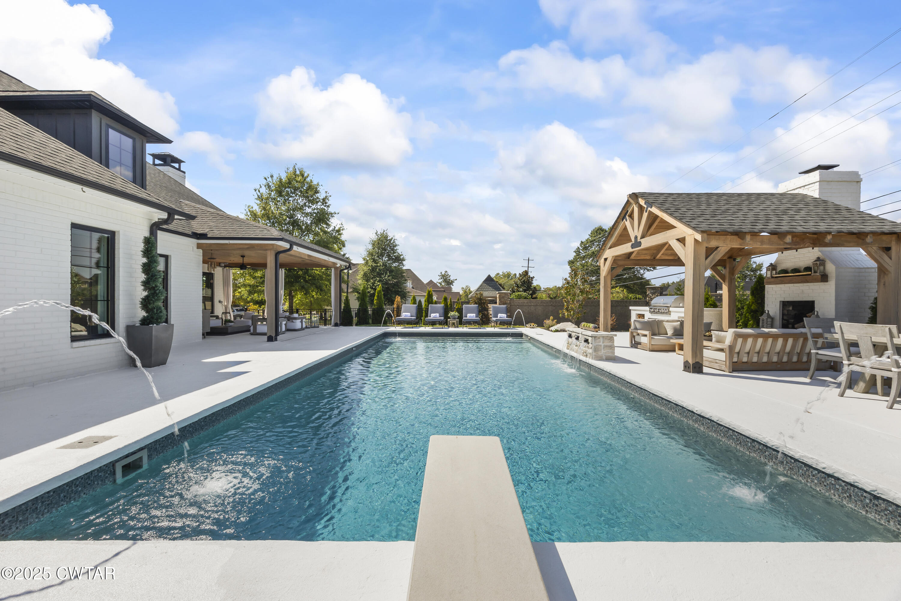 7 Swanbourne Cove Jackson, TN 38305 - Photo 37 of 44 a view of a house with swimming pool