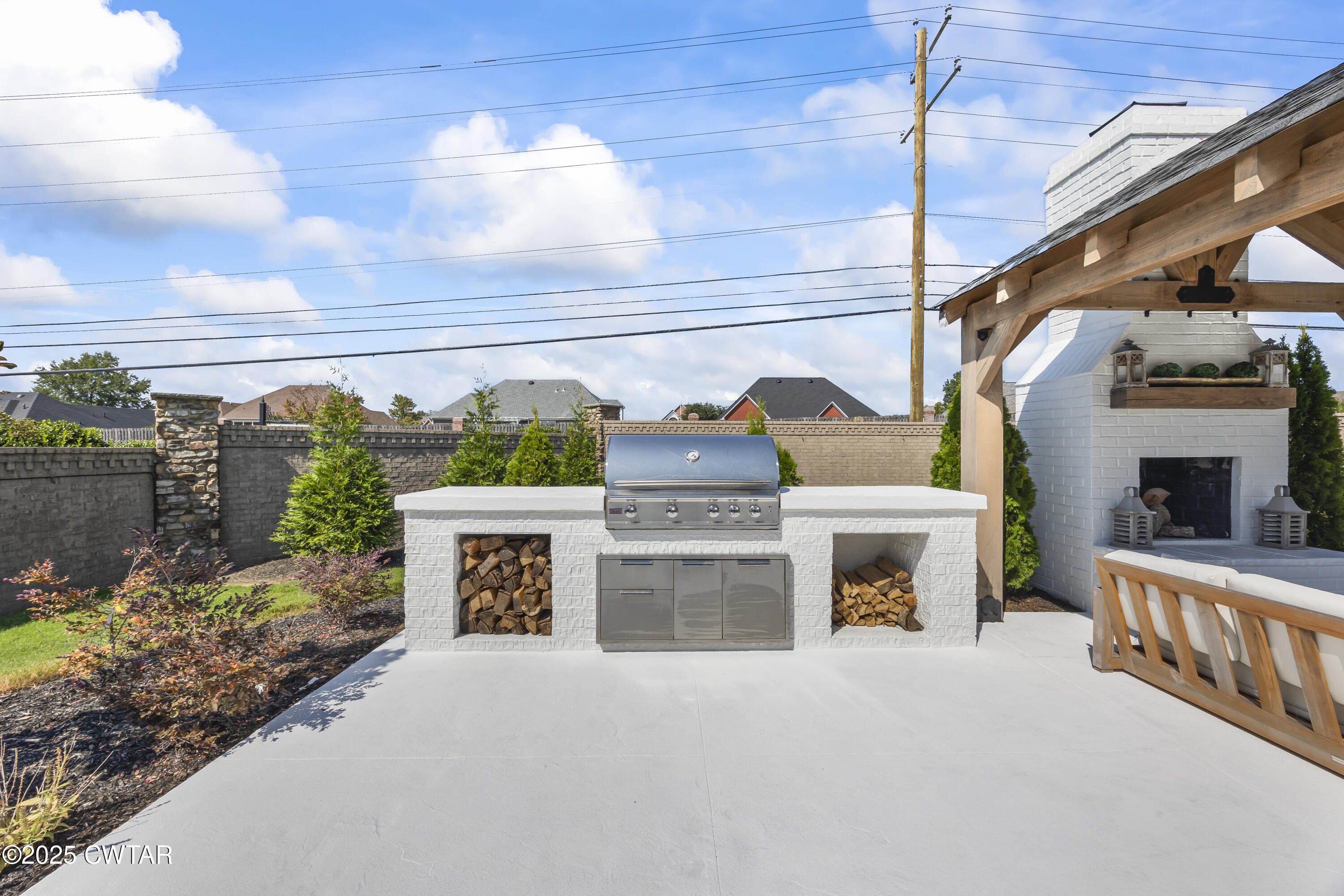7 Swanbourne Cove Jackson, TN 38305 - Photo 40 of 44 a view of a fireplace and a garage
