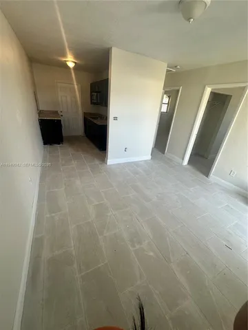 a view of a large space in the hallway