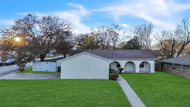 a house view with a garden space