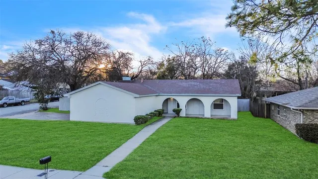 a house view with a garden space