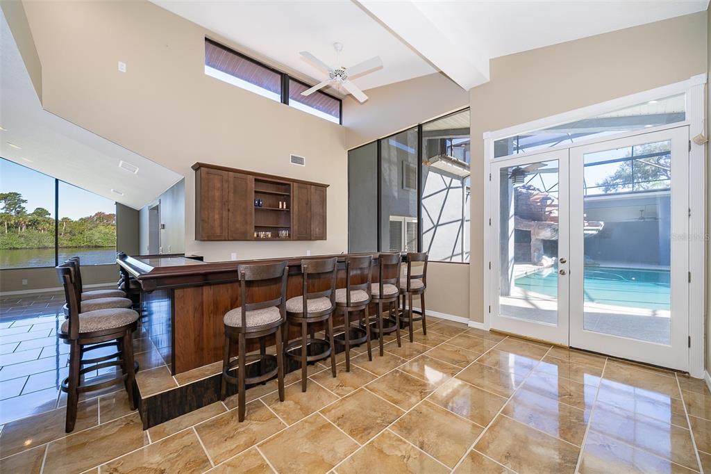 372 Rest Haven Road Geneva, FL 32732 - Photo 16 of 68 a view of a chairs with a table and chairs