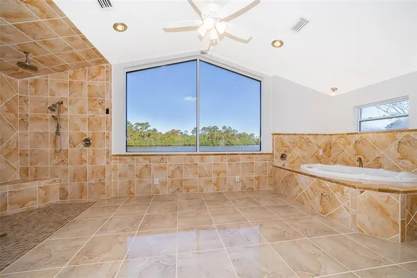 a view of a kitchen with a sink and cabinets