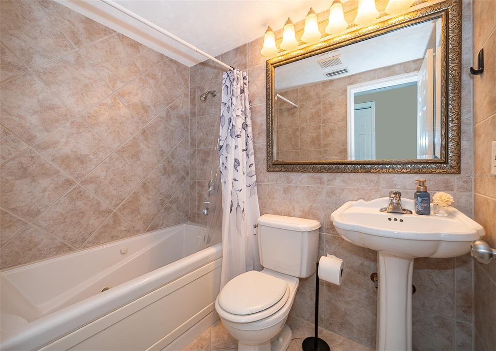 372 Rest Haven Road Geneva, FL 32732 - Photo 37 of 68 a bathroom with a sink toilet and shower