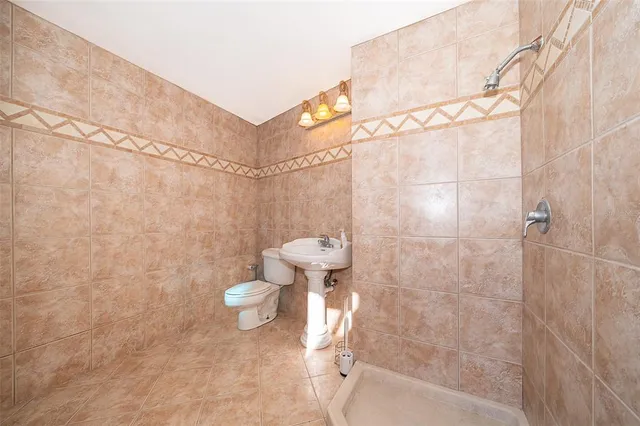 a view of a chair and table in the garden