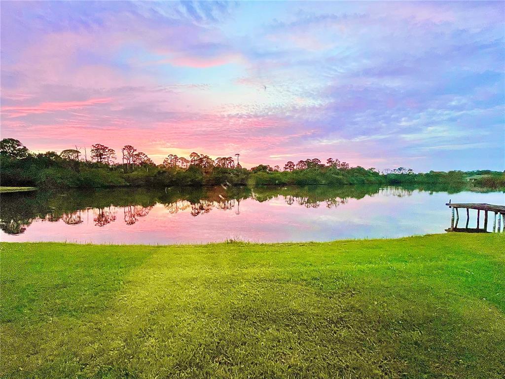 372 Rest Haven Road Geneva, FL 32732 - Photo 60 of 68 a view of a lake with houses in the back