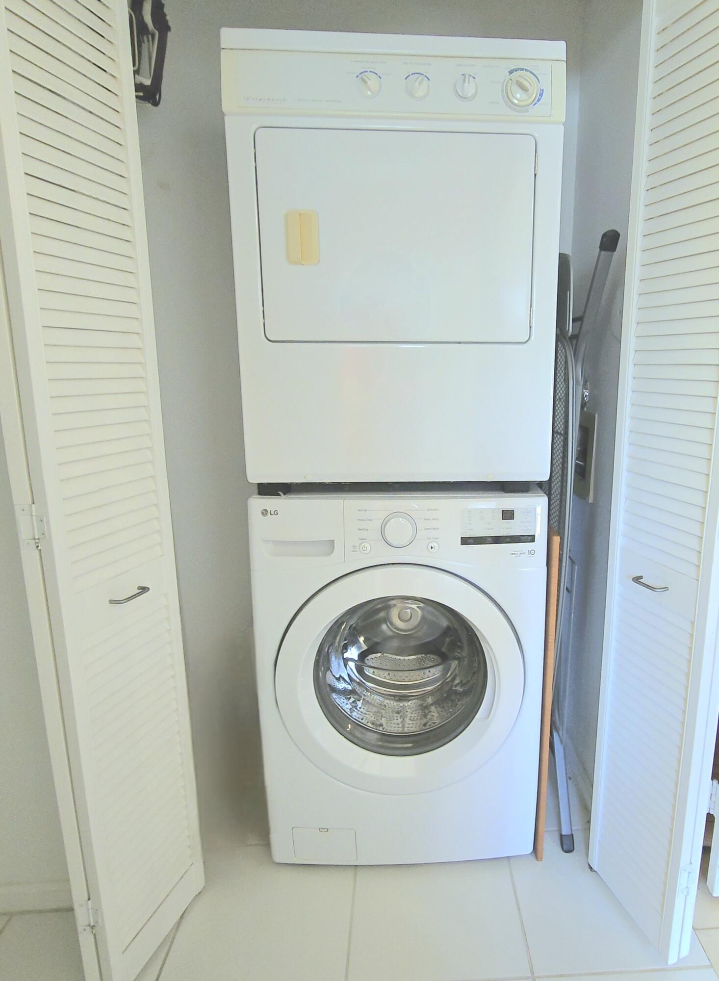 6566 Via Regina, Unit 6566 Boca Raton, FL 33433 - Photo 15 of 17 Washer Dryer inside