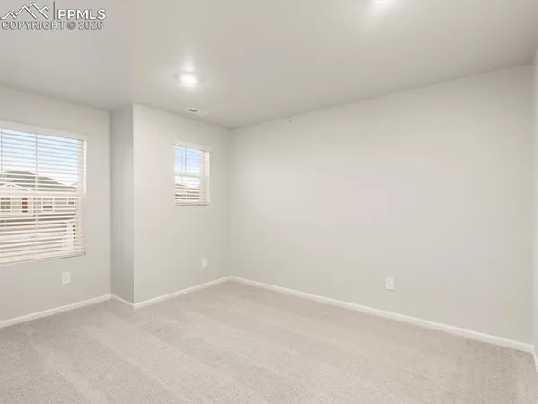a view of storage and utility room with washer and dryer
