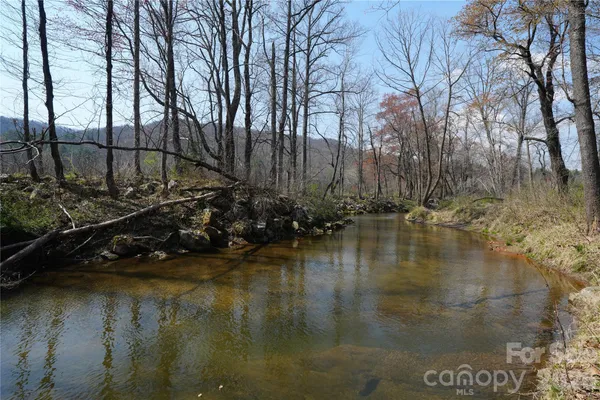 a view of water body of water with a house
