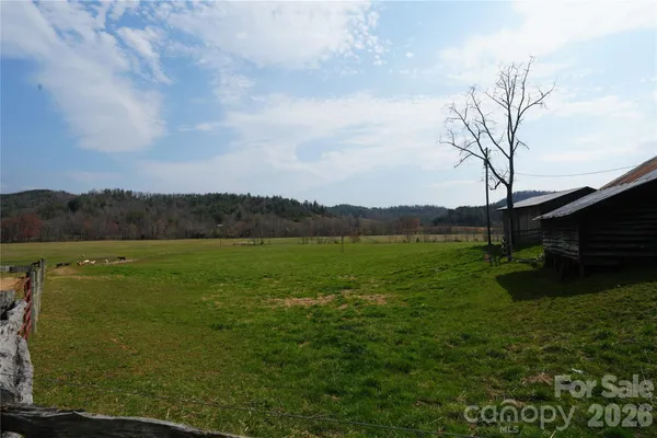a view of a lake with a yard