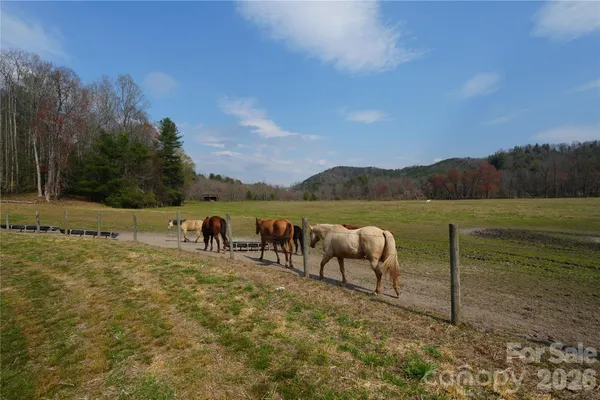 a view of a lake with mountain in the background