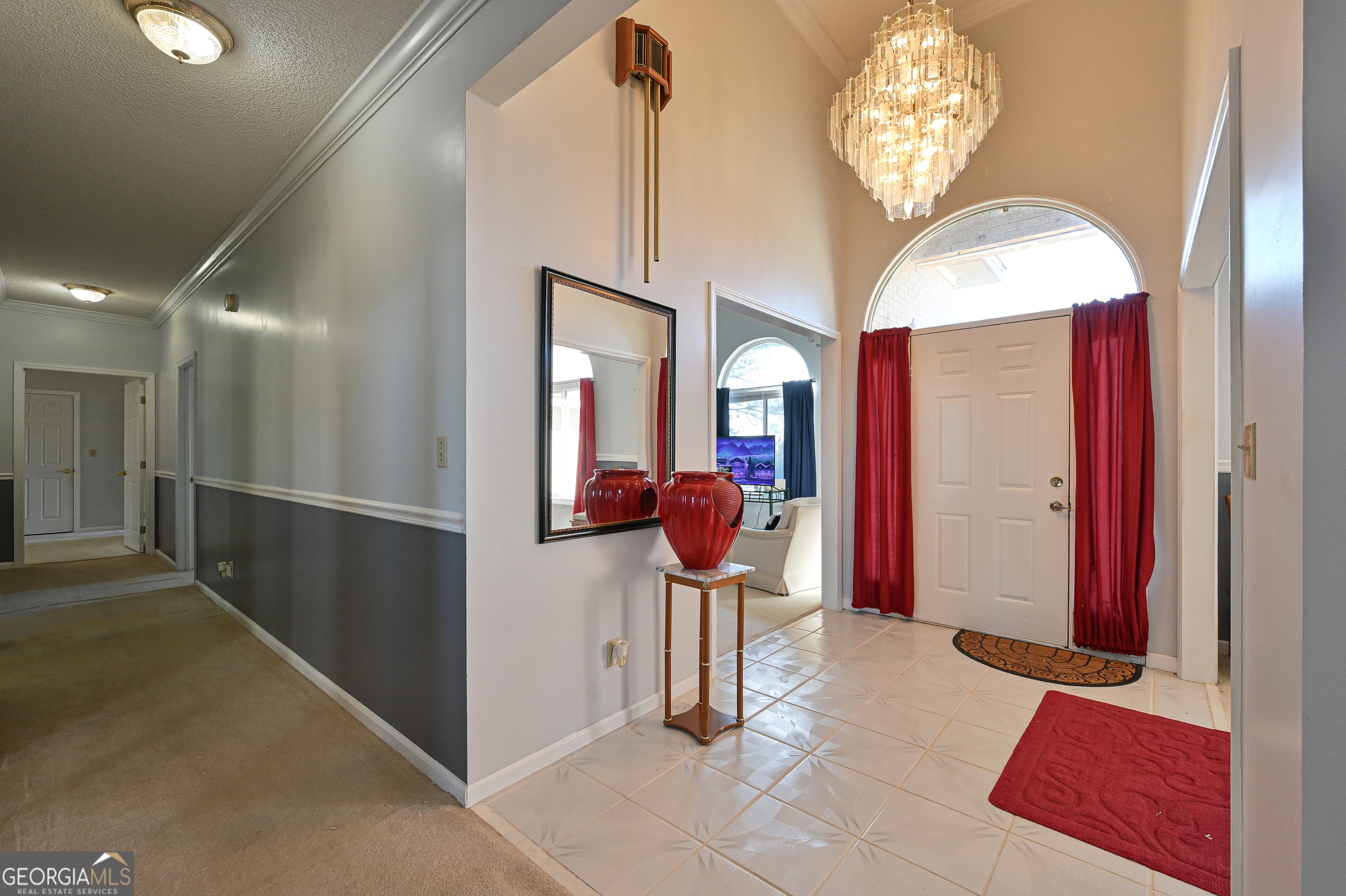 5152 Sandy Bottom Road Blakely, GA 39823 - Photo 12 of 40 a view of a livingroom with furniture and chandelier